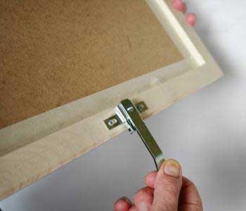 Anti-Theft for Wooden Picture Frames: SpringLock Release and Marker Tool