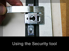 Anti-Theft for Wooden Picture Frames: SpringLock Release and Marker Tool